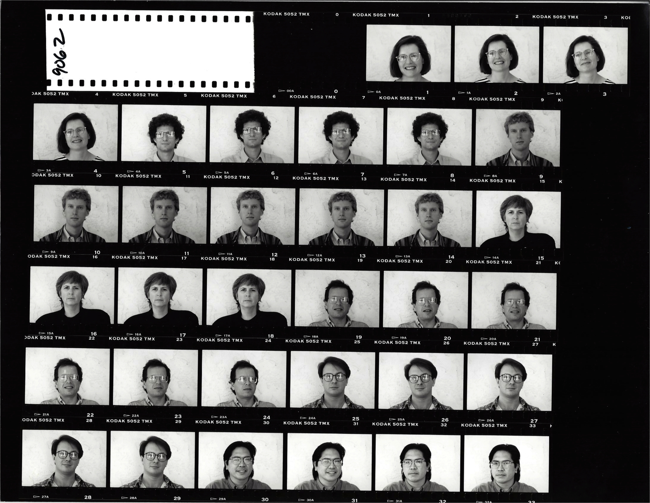 black and white scan of photo film negative rolls featuring headshots of faculty from the early 90s including Dr. Carol Padden and Dr. Daniel Hallin