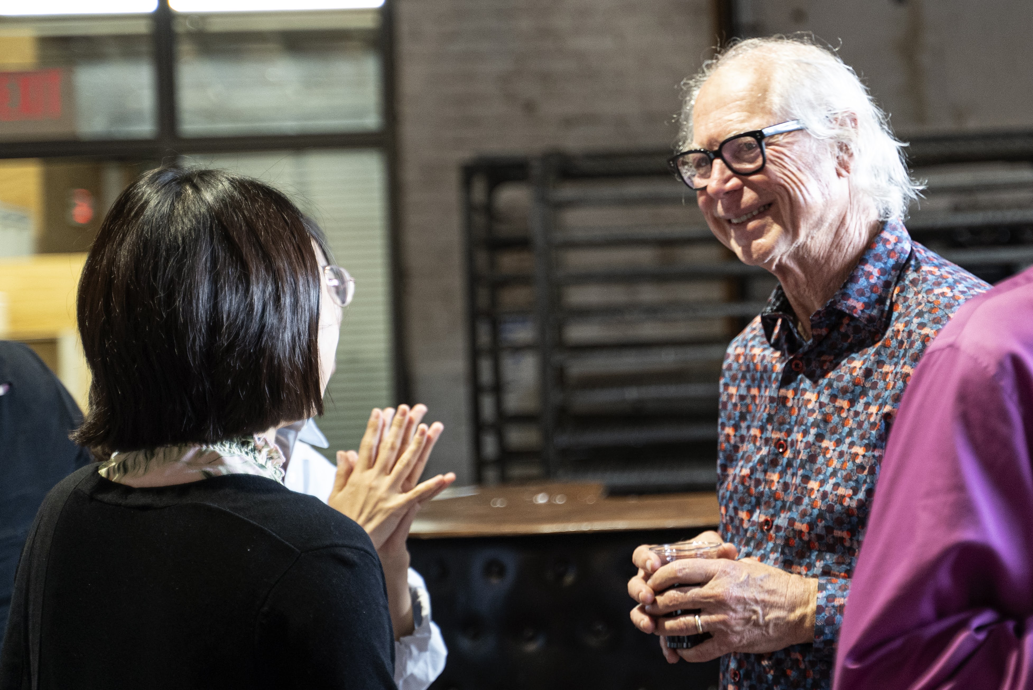 Dan speaks with former students